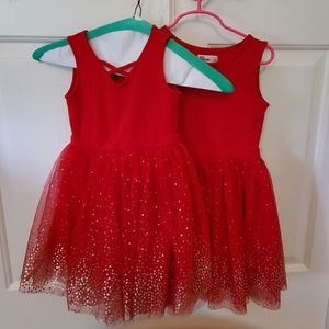 Girls matching red and gold dresses (Epic Threads)